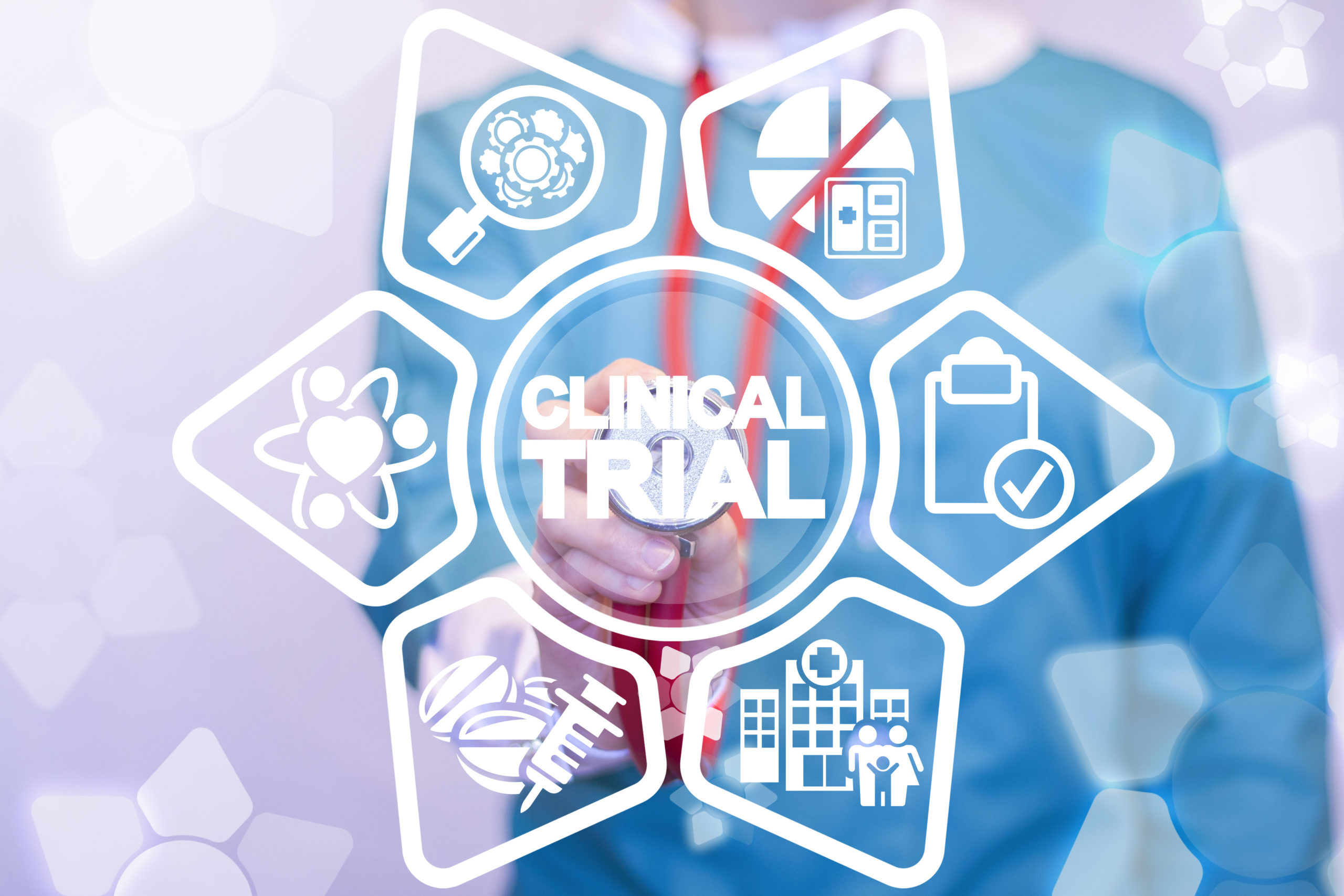 Woman medic touches a clinical trial words surrounded by specifi